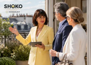 SHOKO presenting Paris market data to a Swiss and Luxembourg buyer couple in a Saint-Germain residence
